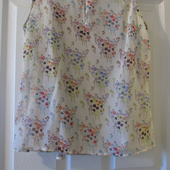 Cute CAbi Floral Semi Sheer Sleeveless Top with a built-in camisole - Picture 9 of 9